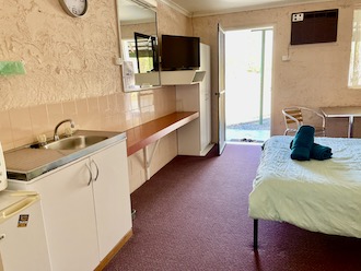 Photo of motel room 2 kitchenette.