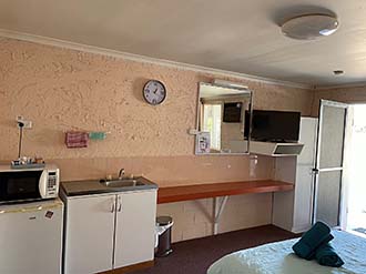 Photo of motel rooms 4 and 5 kitchenette.