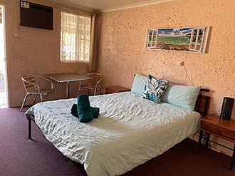 Photo of motel room 2 beds.
