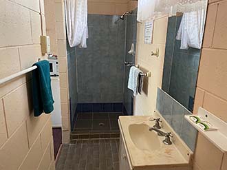 Photo of motel rooms 1 and 3 bathroom.